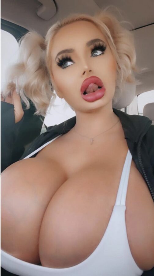 Huge fake boobs escort woman
